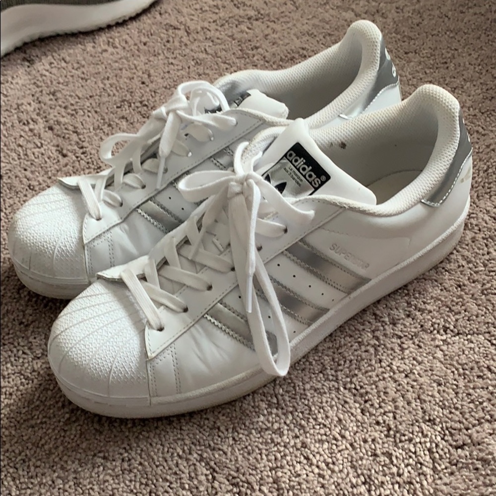 Silver Adidas superstars